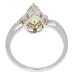 Elegant Green Peridot 14K White Gold Ring showcasing a pear-shaped gemstone with diamond accent from the side view.