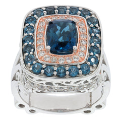 Cushion Blue London Topaz Sterling Silver Ring with Moissanite accents and intricate detailing.