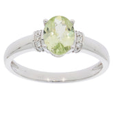 Green Peridot 14K White Gold Ring with diamond accents, showcasing elegance and luxury in jewelry fashion.