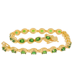 Elegant oval green chrome diopside bracelet in sterling silver, showcasing sparkling gemstones for luxury style.