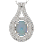 Elegant oval white opal sterling silver pendant set with sparkling accent gemstones, perfect for sophisticated style.