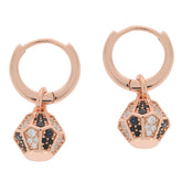 Rose gold hoop earrings with black and white diamond accents for elegant style.