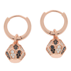 Rose gold hoop earrings with black and white diamond accents for elegant style.