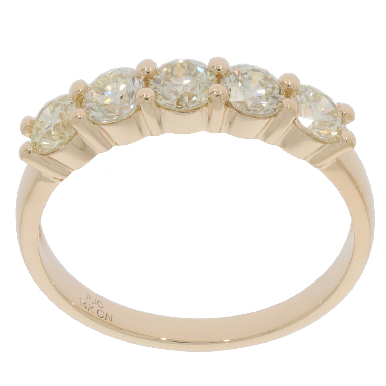 Round gold ring featuring five sparkling diamonds, elegantly set in 14K gold for a luxurious look.
