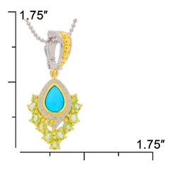 Blue turquoise sterling silver pendant with vibrant green accents and sparkling gemstones, elegant jewelry piece.
