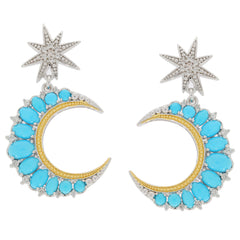 Elegant turquoise crescent earrings with star accents, featuring a vibrant blue gemstone design in silver.