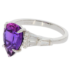 Pear purple amethyst sterling silver ring with accent stones, showcasing luxury and elegance.