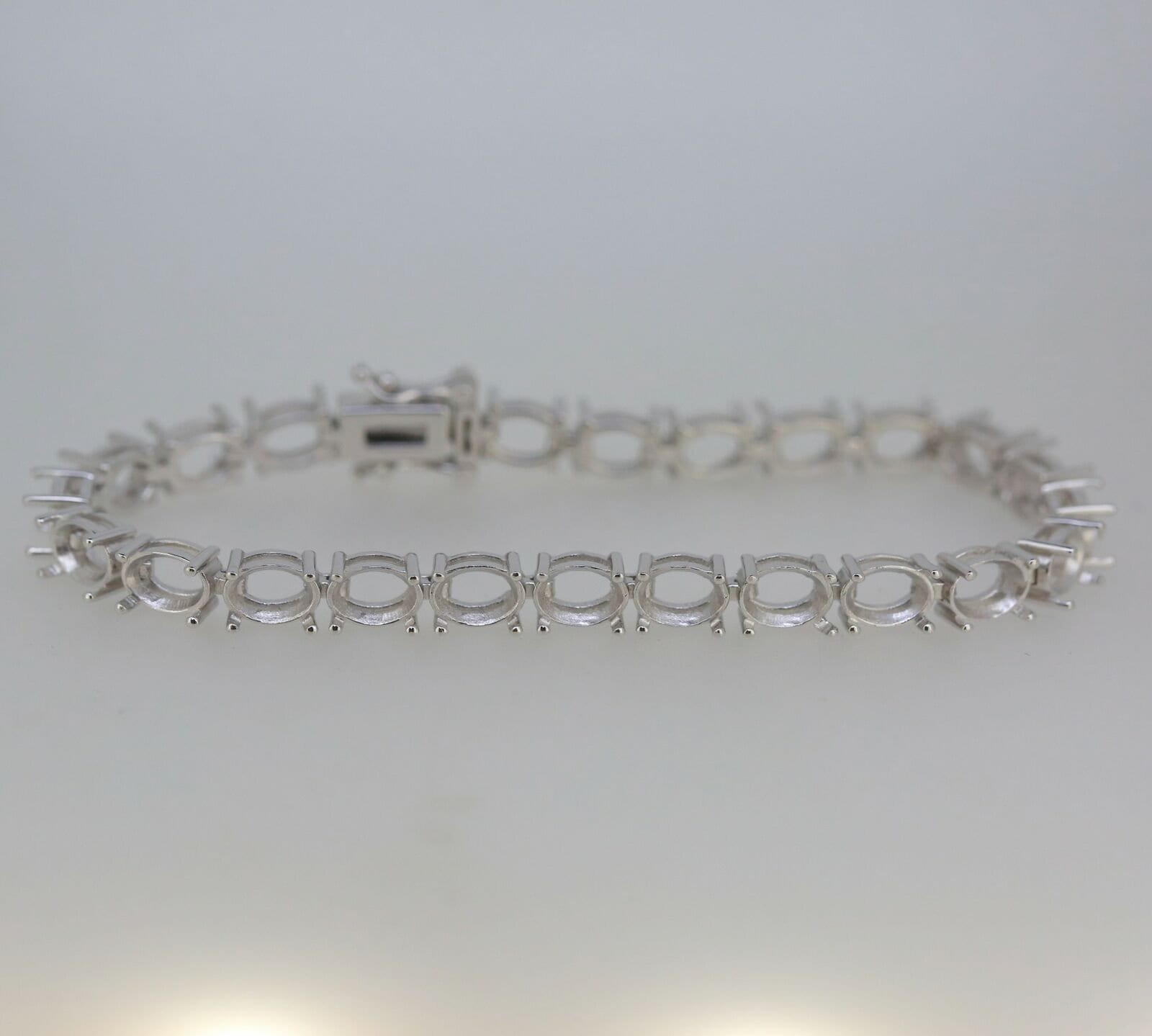 Sterling silver semi mount tennis bracelet setting oval 7x5mm, stainless steel tongue for durability, made to order.