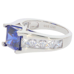 Princess blue sapphire sterling silver ring with sparkling accents, showcasing elegance and luxury.