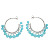 Elegant blue turquoise sterling silver earrings with sparkling gemstone accents, perfect for any sophisticated collection.