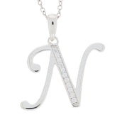 Elegant sterling silver initial 'N' pendant with sparkling gemstones on a delicate chain.
