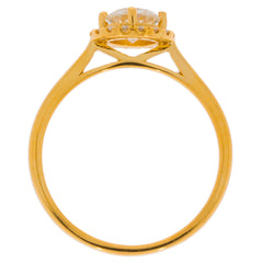 Round white diamond ring in 14K yellow gold, showcasing a brilliant gemstone and elegant design.