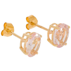 Round pink sapphire earrings set in 14K yellow gold, featuring a sparkling gemstone for an elegant look.