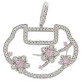 Pink Sapphire sterling silver pendant featuring flower designs and sparkling gemstones for elegant style.