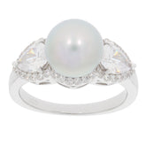 Elegant white pearl sterling silver ring with sparkling gemstone accents, showcasing timeless beauty and luxury.