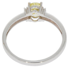 Elegant Green Peridot 14K White Gold Ring featuring a stunning diamond accent, showcasing luxurious craftsmanship.