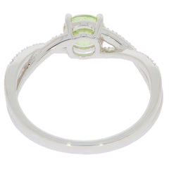 Back view of a Green Peridot 14K White Gold Ring showcasing sparkling gemstones and a sleek band design.