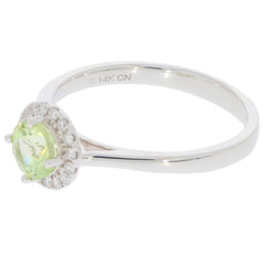 Elegant Green Peridot sterling silver ring with Moissanite accent, showcasing timeless beauty and luxury.