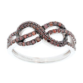 Elegant infinity design ring featuring sparkling red gemstones set in sterling silver.