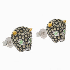 Elegant sterling silver earrings featuring a panther design with sparkling green accents and intricately detailed stones.