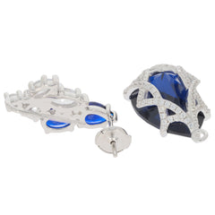 Luxury pear blue sapphire sterling silver earrings with sparkling accents, showcasing elegant gemstone design.