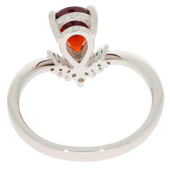 Elegant Pear Red Garnet Sterling Silver Ring with Moissanite Accent, showcasing a luxurious design.