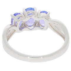 Elegant oval blue tanzanite sterling silver ring featured from the back with sparkling accents.