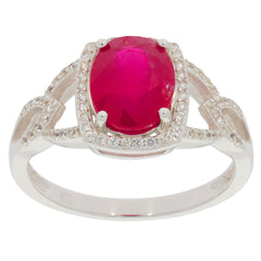 Elegant oval red ruby sterling silver ring with sparkling accents, perfect for a luxurious touch to any outfit.