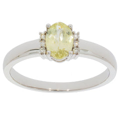 Elegant Green Peridot ring in 14K white gold with diamond accents, perfect for adding sophistication to any jewelry collection.