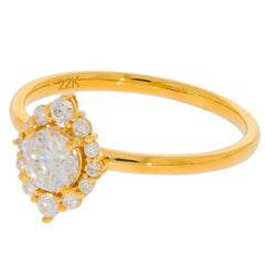 22K gold ring featuring a round diamond center stone and sparkling accent diamonds, elegant and luxurious jewelry piece.