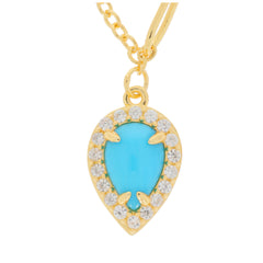 Blue turquoise gemstone pendant necklace with sparkling accents set in gold.