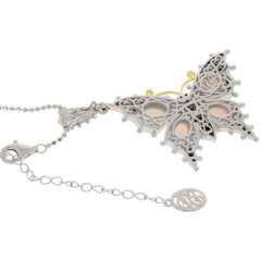 Elegant silver butterfly pendant with intricate filigree design and a shimmering chain attachment.