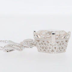 Oval white moissanite sterling silver necklace with intricate design and sparkling gemstone accent.