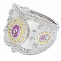 Elegant sterling silver ring featuring pink sapphires and sparkling accents for a luxurious look.