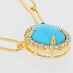 Close-up of a blue turquoise gemstone necklace with silver accents, showcasing its elegance and luxury.