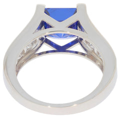 Princess blue sapphire sterling silver ring showcasing a brilliant princess cut gemstone from inside view.