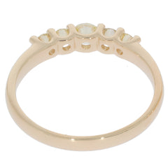 Round green diamond ring in 14K yellow gold, featuring sparkling accents for a luxurious look.