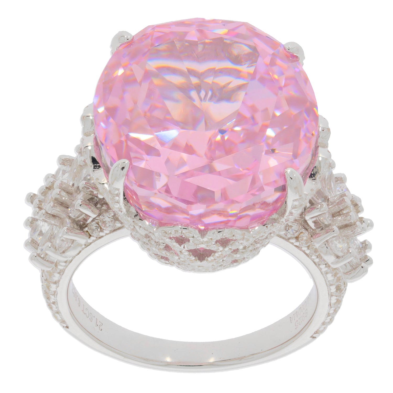 Oval pink sapphire sterling silver ring with intricate accents, radiating elegance and luxury.
