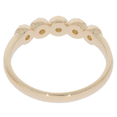 14K yellow gold ring featuring a unique round design with five raised accents, elegant and stylish for any occasion.