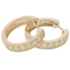 Round green diamond 14K yellow gold earrings with sparkling accents for a luxurious style.