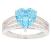 Heart-shaped blue topaz sterling silver ring with accent stones, showcasing elegance and luxury.