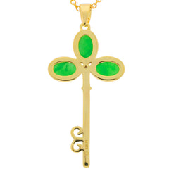 Elegant green jadeite pendant in a key shape, featuring three jade stones set in gold.