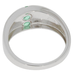 Interior view of a Round Green Emerald Sterling Silver Ring showcasing sparkling emerald accents.