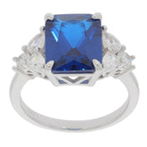 Emerald blue sapphire sterling silver ring with accent gemstones, showcasing elegance and luxury in design.
