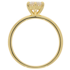 Round white diamond ring in 14K yellow gold setting, showcasing a sparkling gemstone with elegant design.