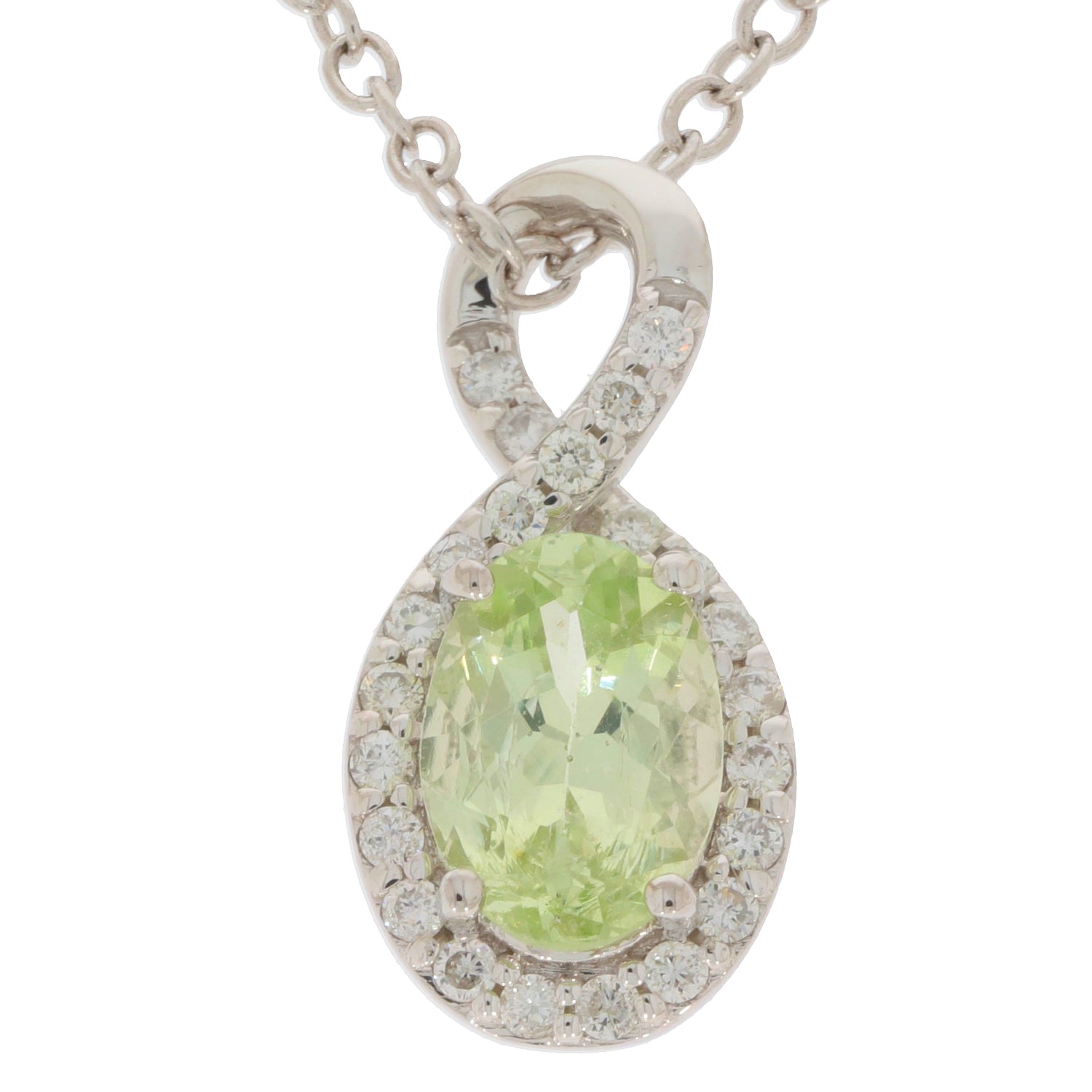 Oval green peridot pendant in 14K yellow gold with diamond accents, elegant jewelry piece for any occasion.