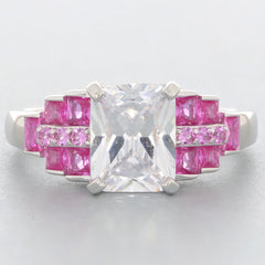 Elegant ring featuring a large clear gemstone with pink accents, perfect for sophisticated style and luxury.