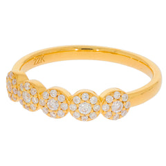 Elegant 22K yellow gold ring adorned with sparkling diamond accents, perfect for luxurious style.