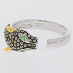 Unique sterling silver cuff ring featuring a panther design with green accents and black stone embellishments.