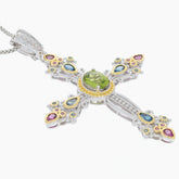 Elegant green peridot sterling silver pendant with colorful topaz accents, showcasing unique gemstone design.